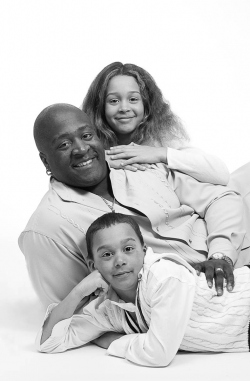Black & White Studio Portrait of Father with his young daughter