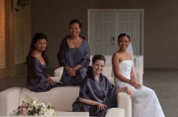Group portrait of Bride, Maid of Honour and Bride's Maids sittin
